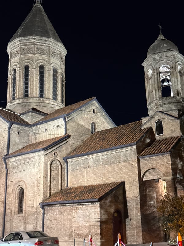 A Tbilisi evening from rooftops to Sameba Cathedral