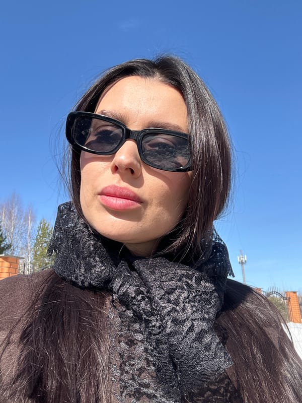 Tourist documents Orthodox churches during sunny day in Chaikovsky, Russia