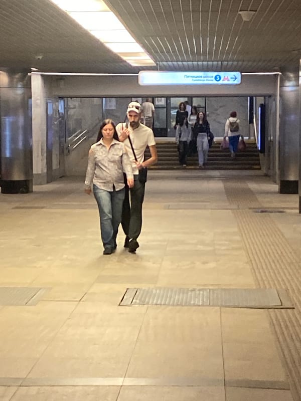 Afternoon street life around a Khimki metro hub