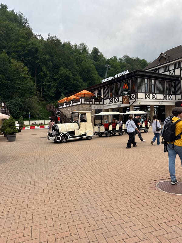 Rosa Khutor resort promenade buzzing on a summer afternoon
