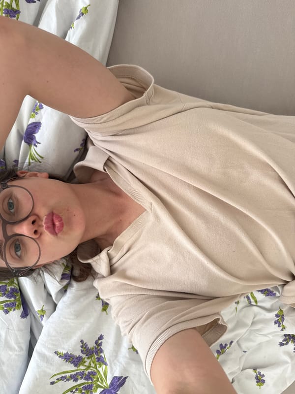 Woman takes multiple selfies in bed in Kőröshegy, Hungary