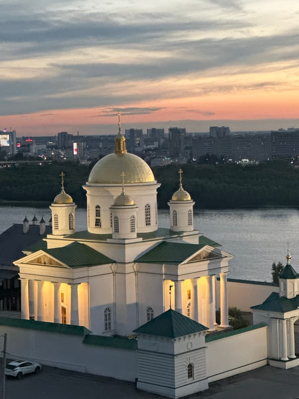 Golden-domed church overlooks river and Nizhny Novgorod skyline
