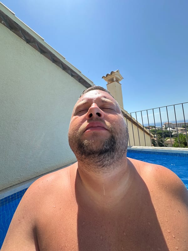 Sunny pool morning in Sant Feliu de Guíxols