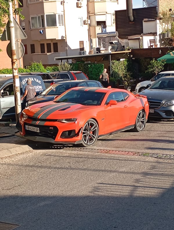 Orange Camaro with Albanian plates spotted on city street