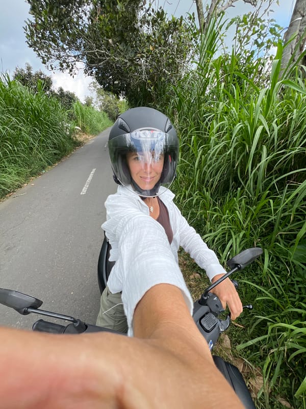 Woman on moped observed in Kintamani, Indonesia