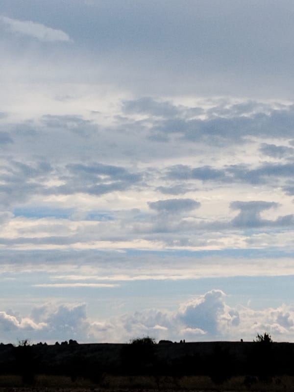 Overcast skies and open fields in rural Ustyvytsya, Ukraine
