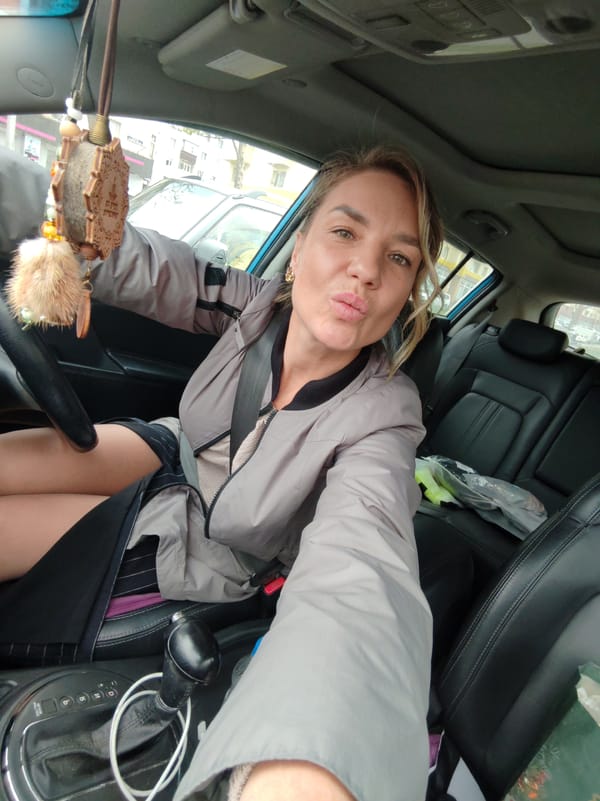 Woman Takes Selfies in Parked Car in Kamchatka