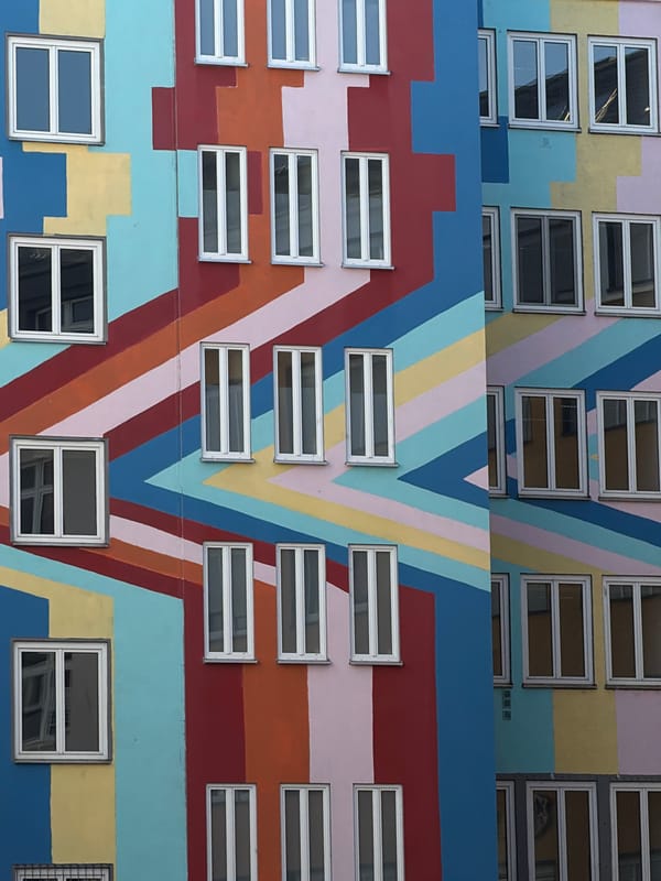 Street art, hanging globes, and Frankfurt skyline in one pass