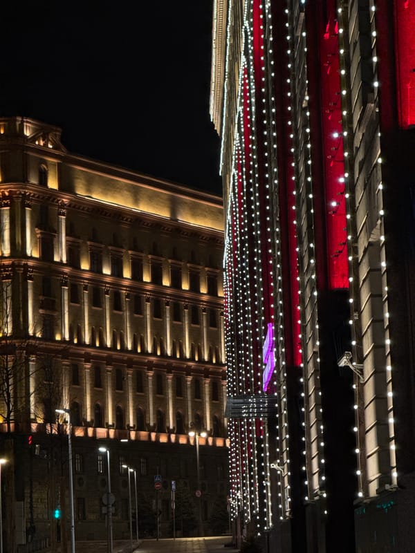 Rainy night scene documented in illuminated Moscow streets
