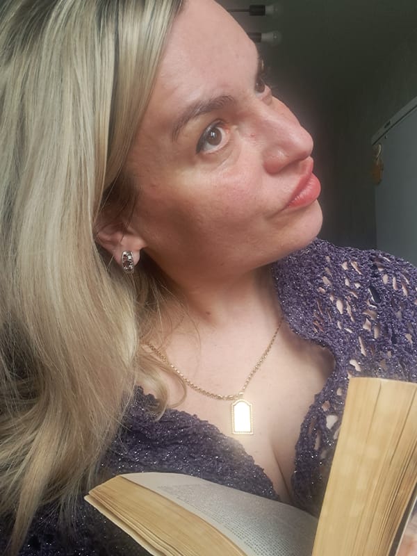 Woman photographed reading indoors in Elektrostal, Russia