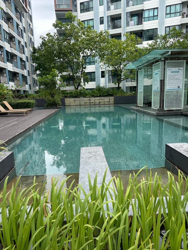 Exploring a Wichit condo complex — gardens, pool, tropical flora