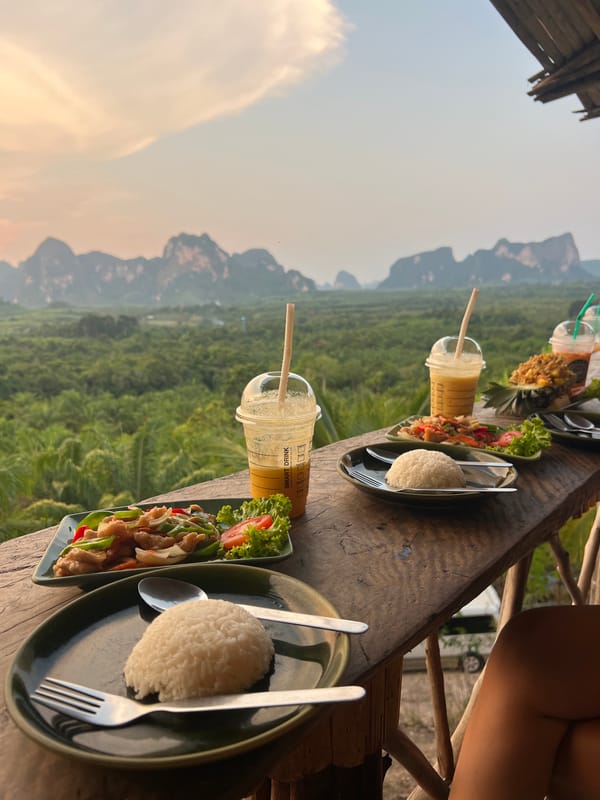 Two visitors enjoy scenic overlook at Khao Thong, Thailand