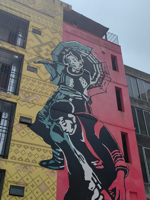 Tourist explores Sa Pa Vietnam streets, murals, hotels
