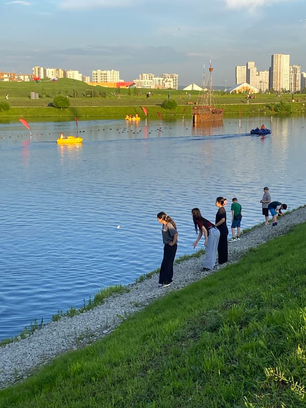 Casual afternoon along Yekaterinburg's riverfront parks and streets