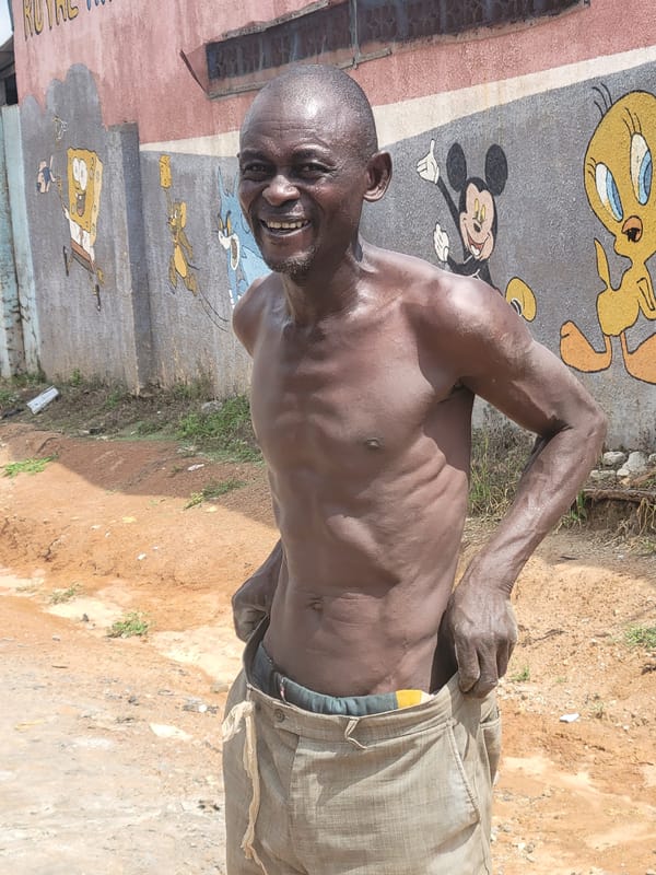 Man observed standing outdoors in Suleja, Nigeria