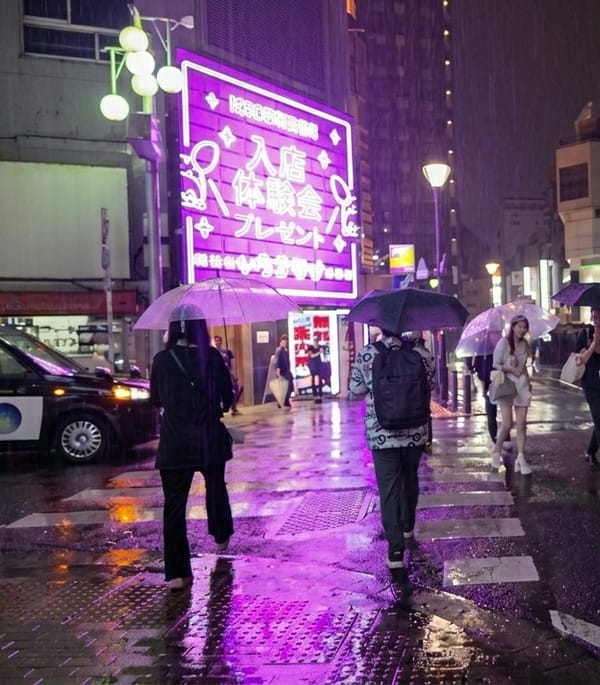 Rainy night scenes documented in Shinjuku district, Japan