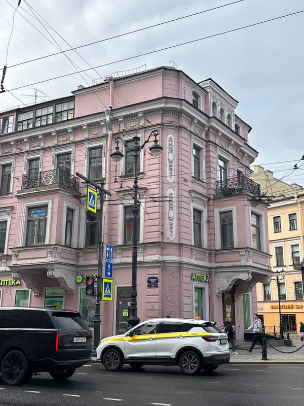 Tourist documents Saint Petersburg landmarks and flag-decorated streets