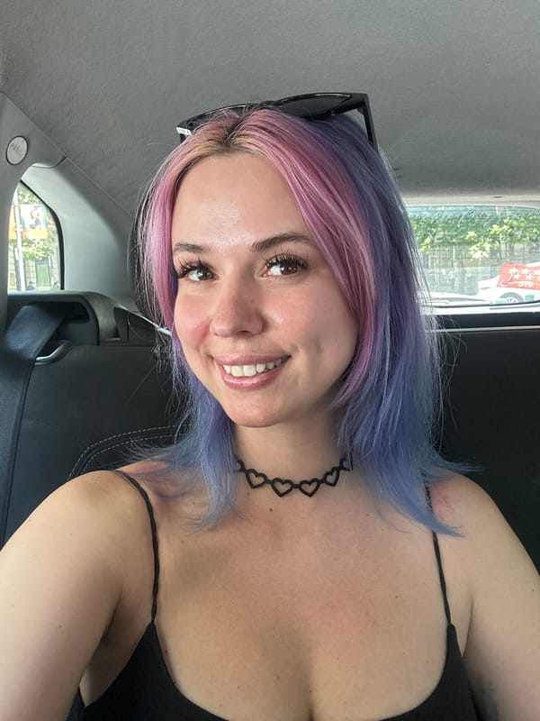 Woman Takes Car Selfie in Madrid