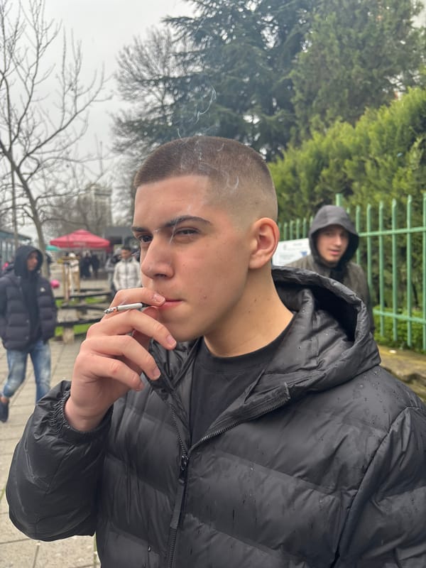Young man smoking cigarette in Burgas, Bulgaria
