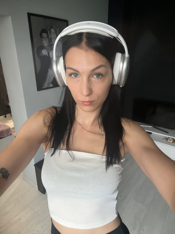 Woman takes selfies indoors, one rotated upside down