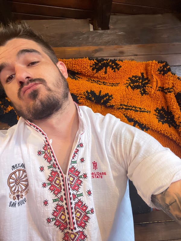 Man Takes Multiple Selfies at Outdoor Restaurant During Morning Hours
