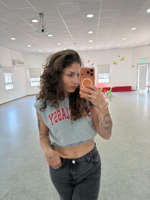 Woman takes selfie in Kiryat Bialik dance studio