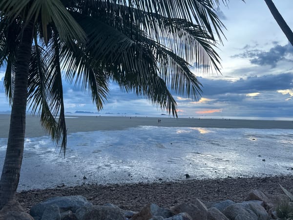 Dusk settling over a quiet Koh Phangan shoreline