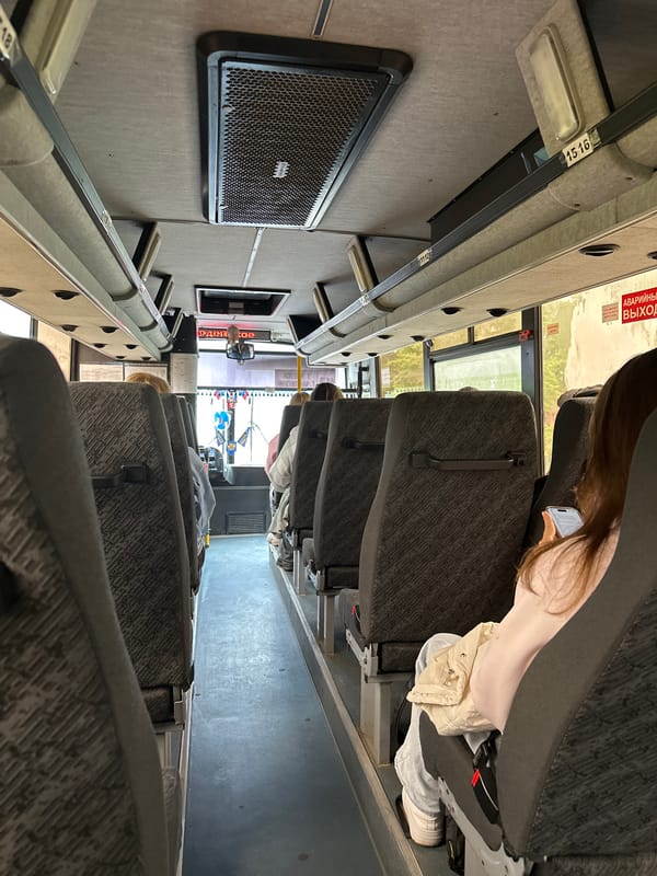Early morning bus journey documented in rainy Chaikovsky, Russia