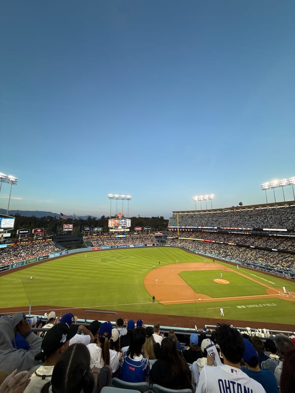 Baseball game at Dodger Stadium with pitcher action