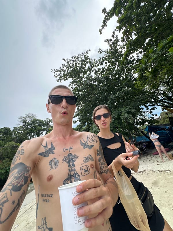 Selfie on Karon Beach, tattoos and shoreline in frame