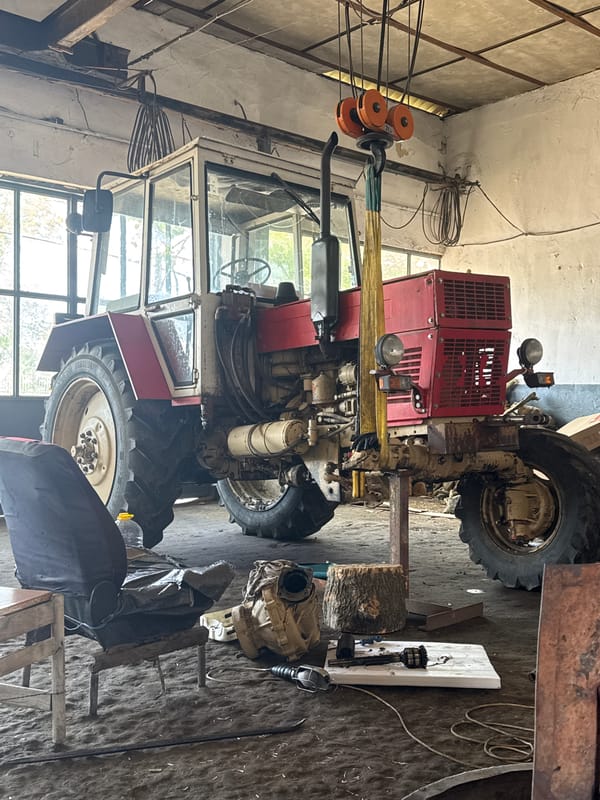 Tractor maintenance session documented at Bulgarian workshop facility