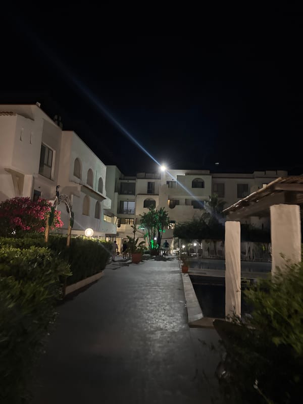 Evening stage performance at Italian resort captures multiple perspectives