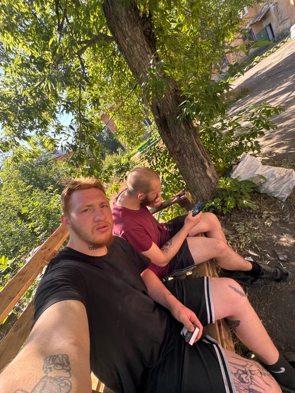 Friends, dogs, and hashtag posts in a sunny outdoor hangout