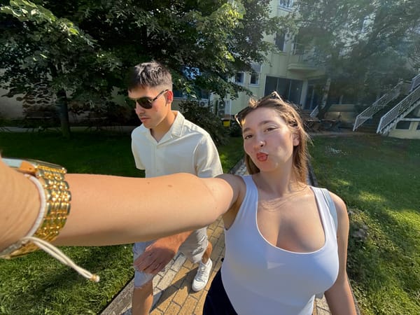 Couple documents leisurely afternoon tour of Bulgarian coastal resort