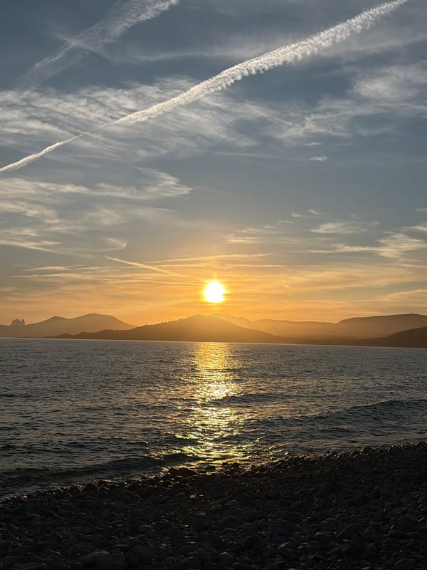 Mediterranean sunset witnessed from Sant Josep beach, Spain