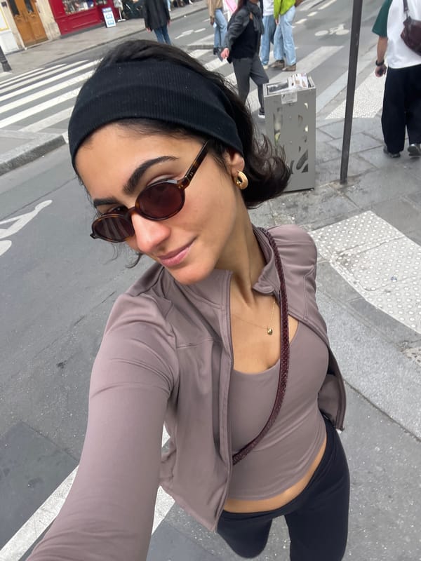 Woman in athletic wear photographed on Paris street