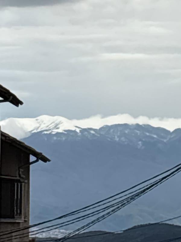 Snow-covered mountains observed from Sandanski, Bulgaria