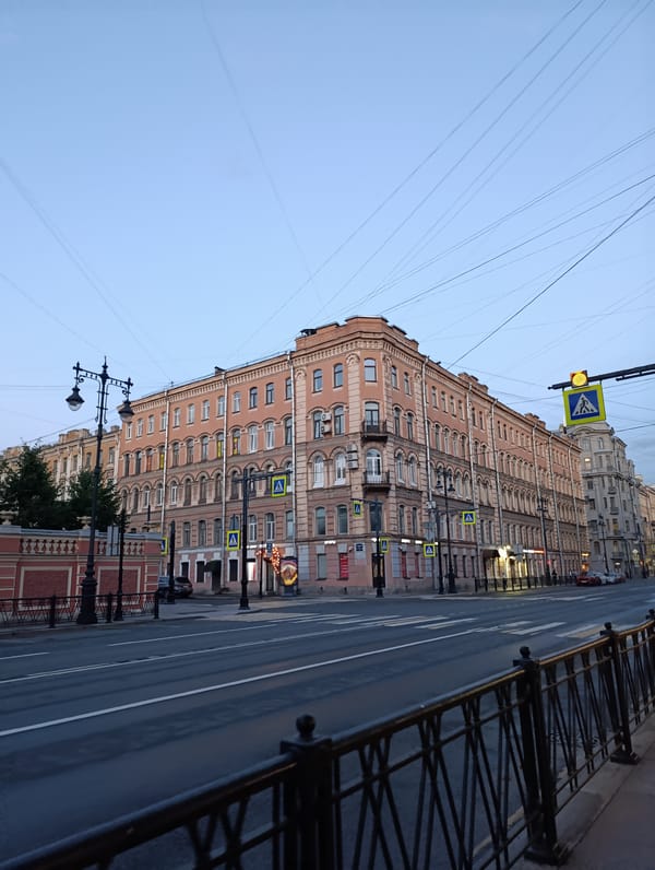 Saint Petersburg streets and storefronts during a June dusk