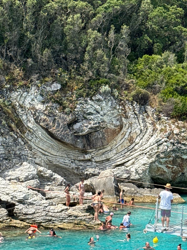 Exploring Antipaxos by boat: coastline swimming spot and sea cave