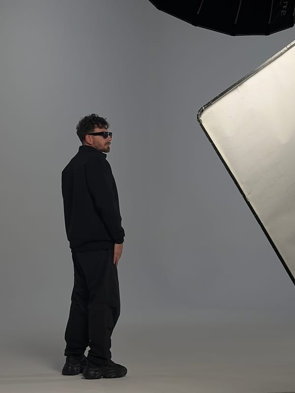 Man in tracksuit photographed in studio setup near Sofia