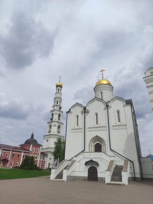 Visitor documents Orthodox monastery grounds and wildlife in Dzerzhinsky