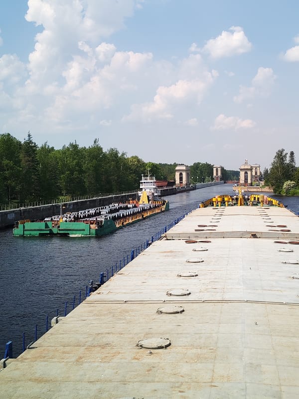Cargo barges transit lock system in Tempy, Russia