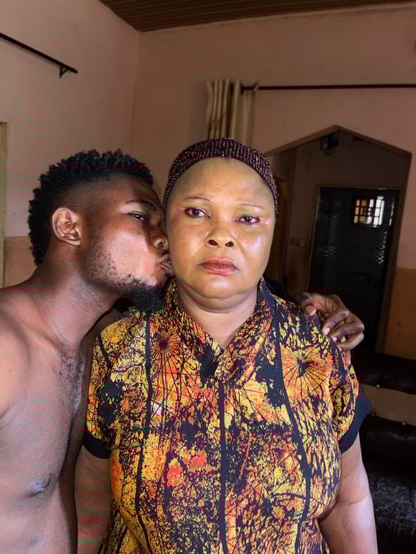Woman and man photographed together indoors in Muchiya, Nigeria