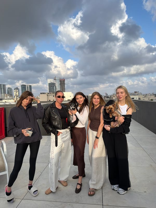 Rooftop gathering captured in Tel Aviv amid dramatic skies