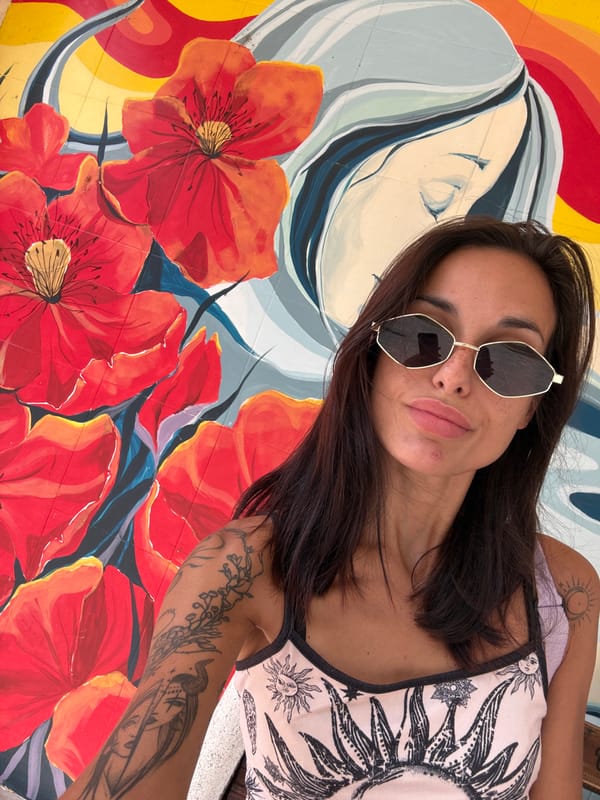 Selfies and street art at a poppy mural in Belene, Bulgaria