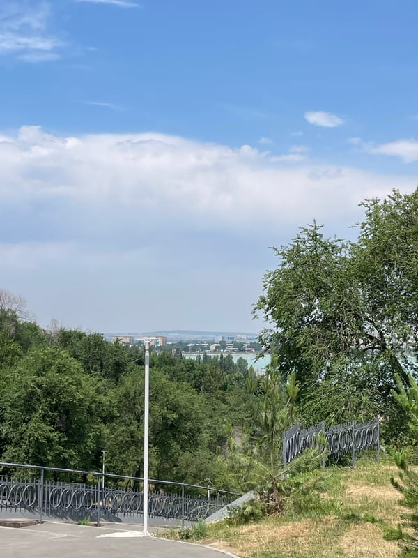 Canal walks and city greenery along Almaty's waterfront parks