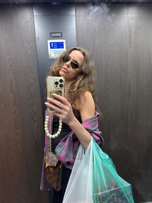 A Moscow afternoon of selfies, street scenes, and rain-wet flowers