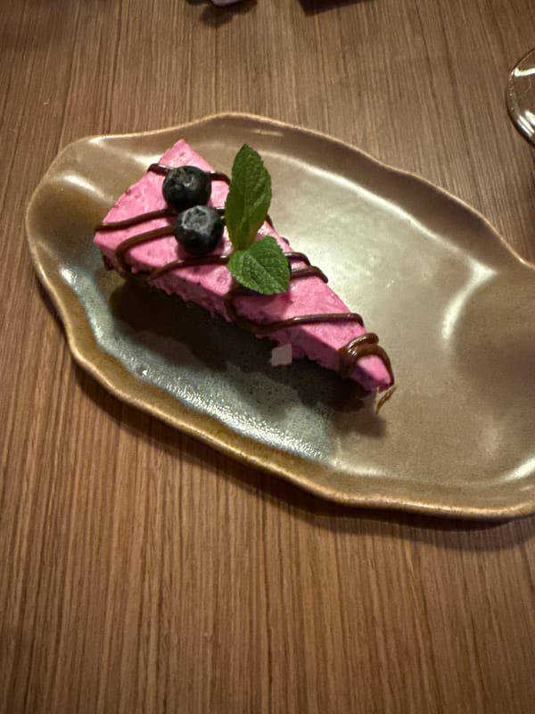 Restaurant meal documented in Sofia featuring steak, dessert, bread