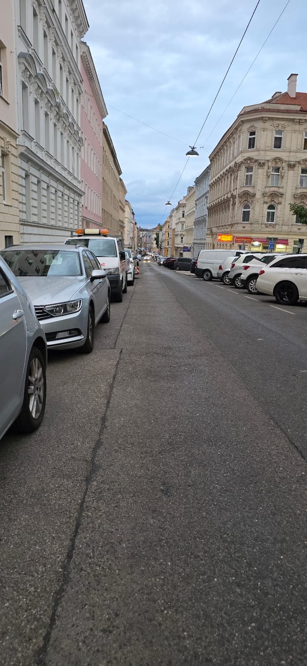 Street-level view down a Vienna city block
