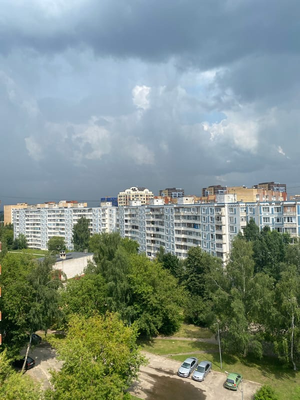 Brutalist apartment blocks and greenery in Dubna, Russia